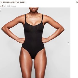 Skims sculpting bodysuit w/ snaps.Size small/medium.percent condition.